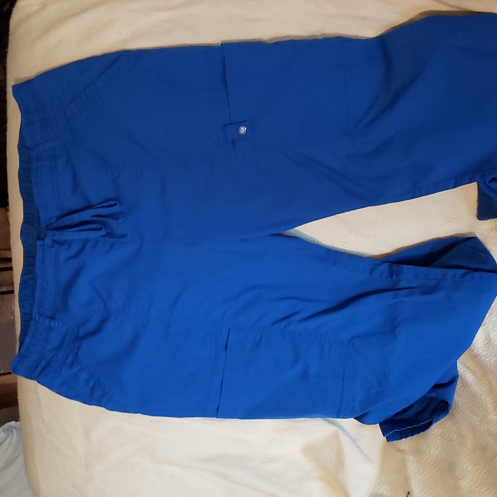 Royal blue scrub pants. 4 pockets. Worn but no rips or stains